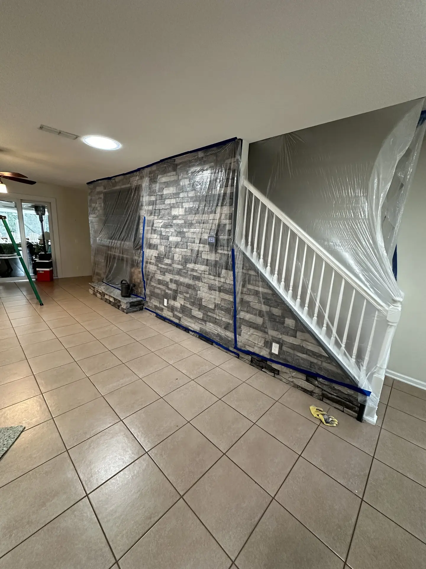 Before flooring removal — old tile and adhesive