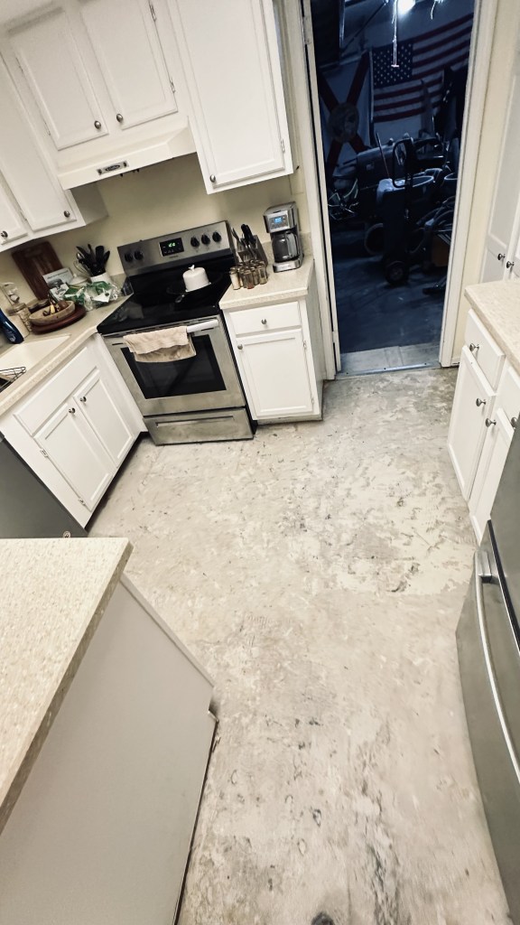 Kitchen slab cleared after water-damaged wood floor removal in Sawgrass, Ponte Vedra Beach, FL
